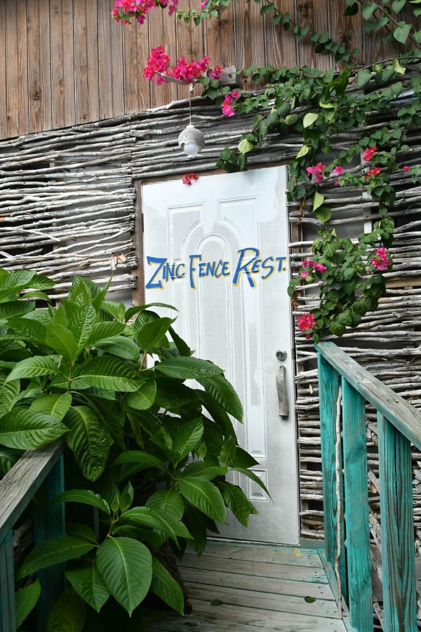 Zinc Fence Rest cabin entrance